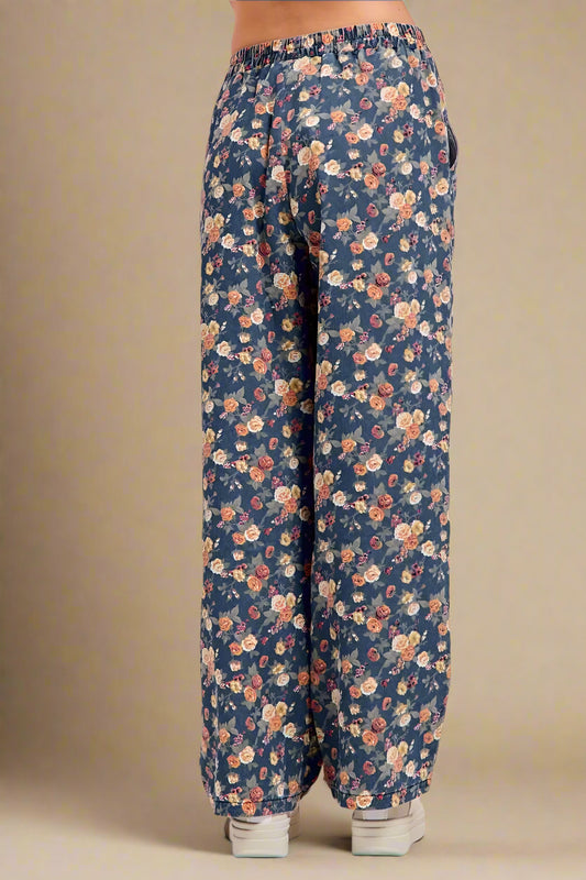 Floral-patterned pants on a plain background