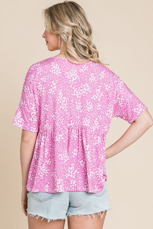 Blusa babydoll con estampado floral rosa