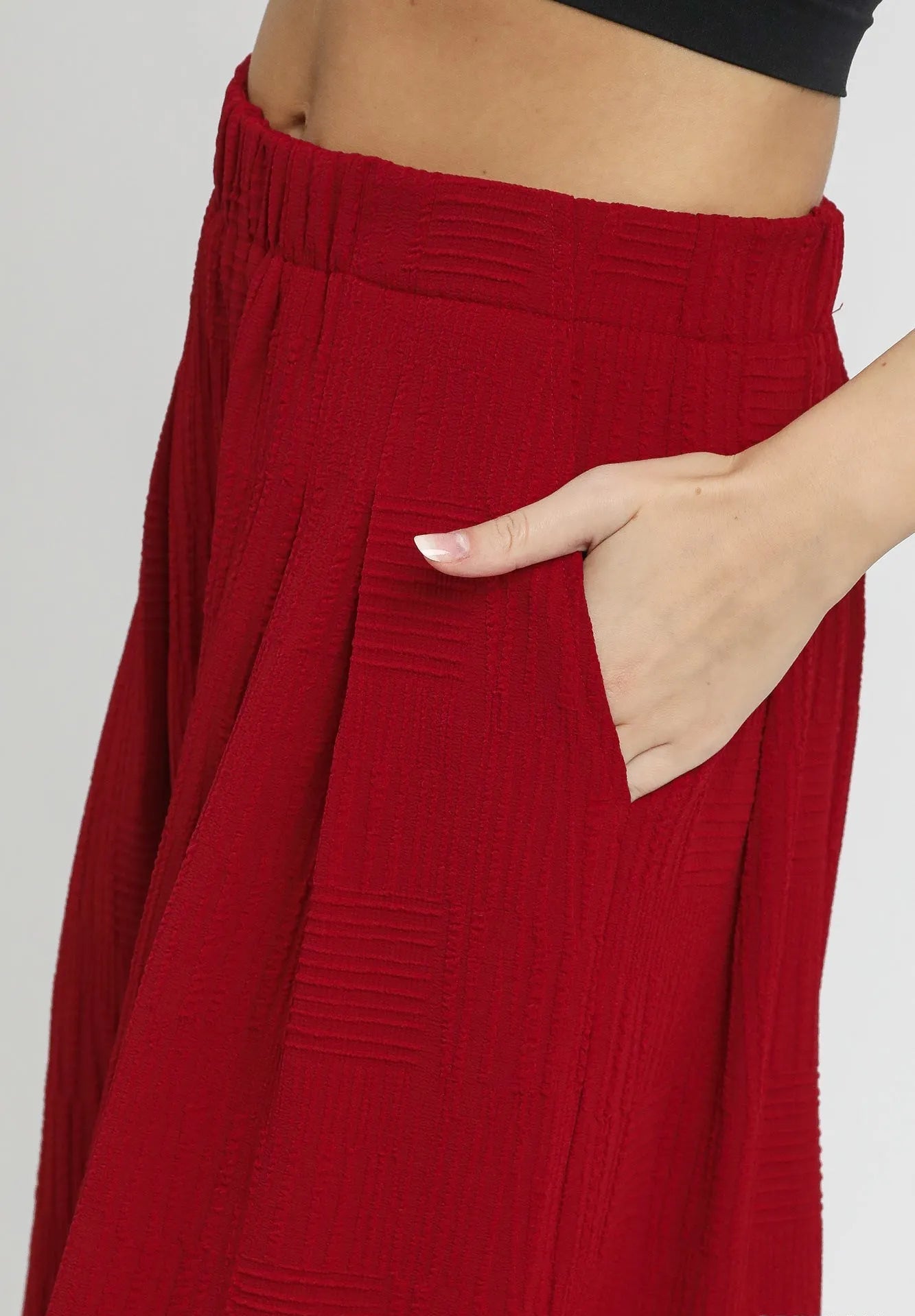 Red pants with a plain background