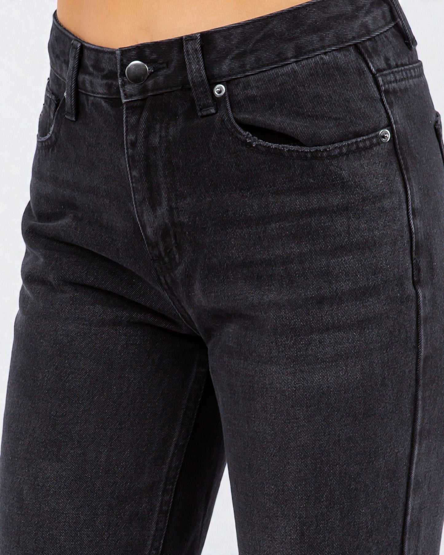 Black jeans with a plain background