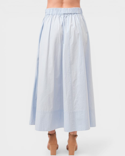 Light blue striped skirt worn by a person on a white background