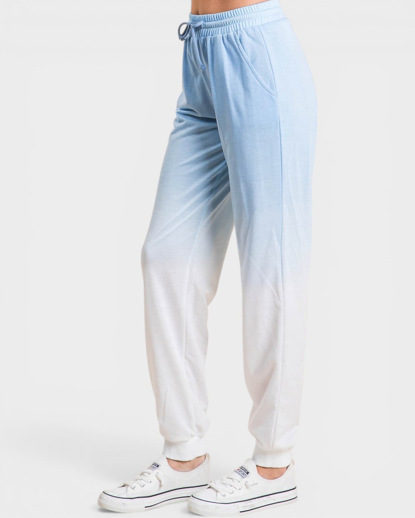 Gradient blue to white pants on a plain background