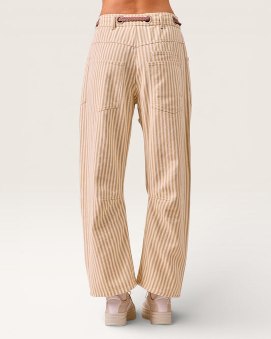 Beige corduroy pants on a white background