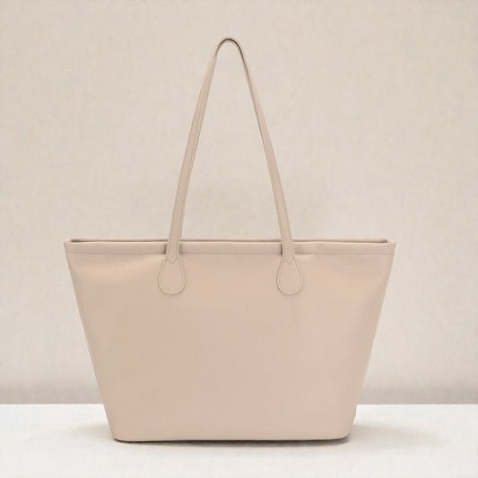 Beige tote bag on a light beige background