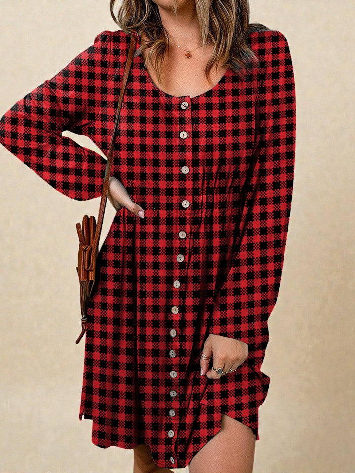 Red and black plaid dress with long sleeves on a beige background