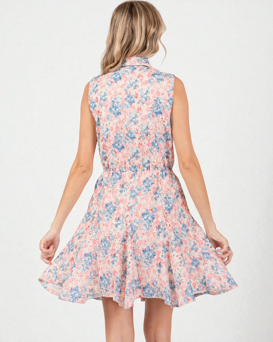 Woman wearing a floral dress on a white background