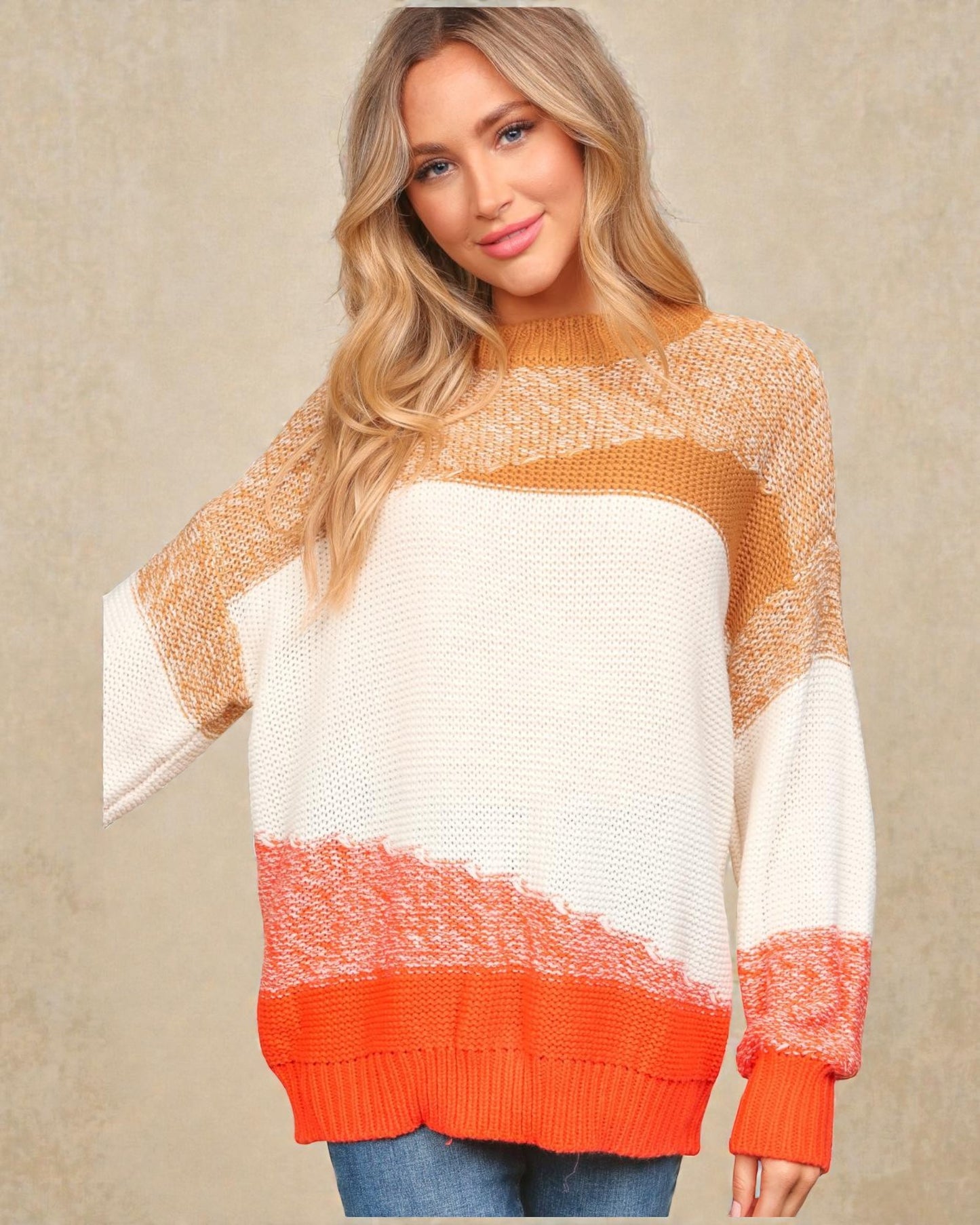 Woman wearing a colorful sweater with a beige background