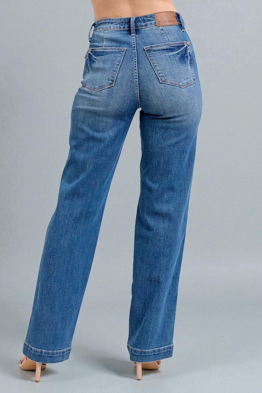 Blue jeans on a gray background