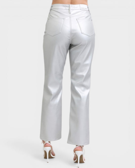 Silver metallic pants on a white background