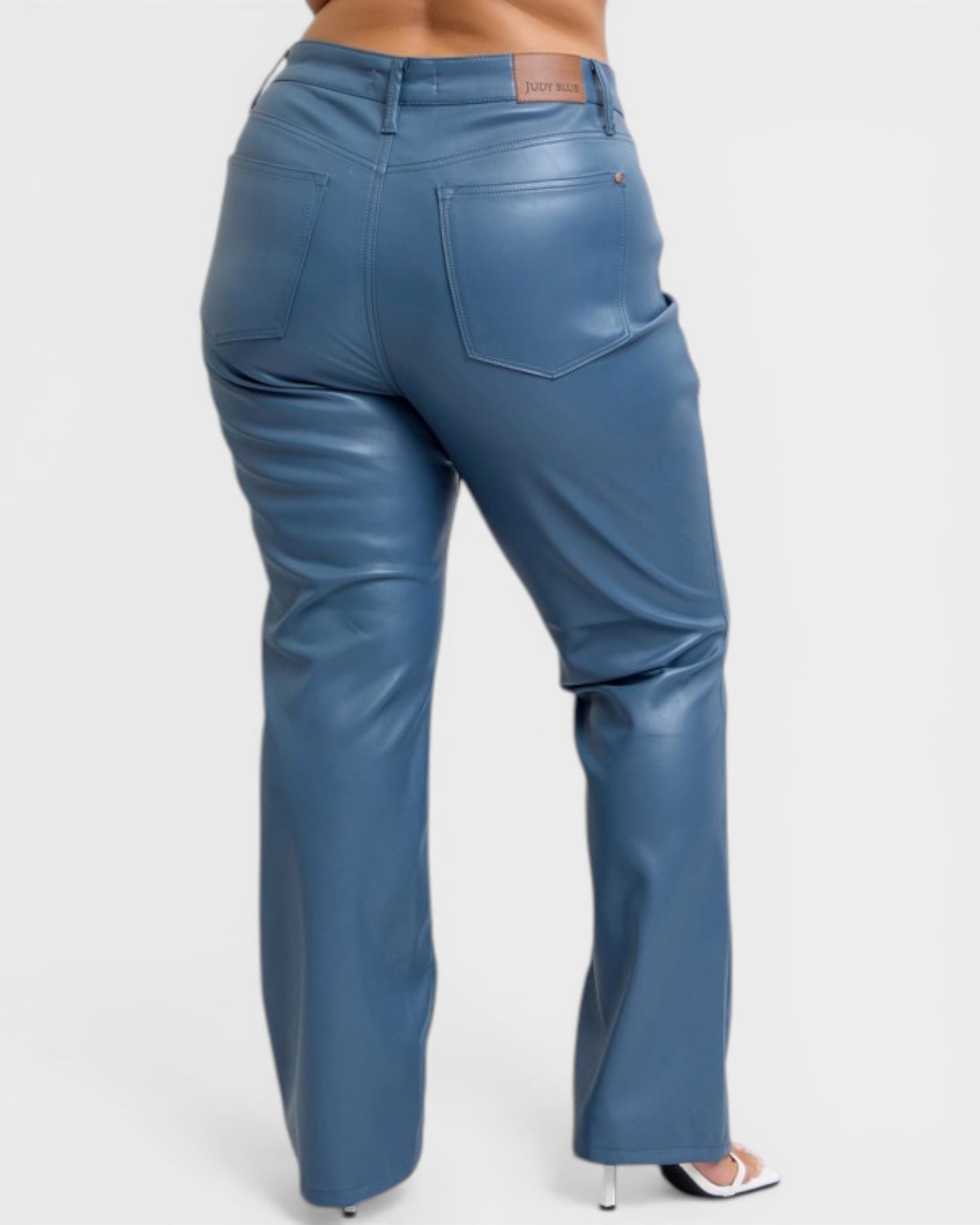 Blue leather pants on a white background