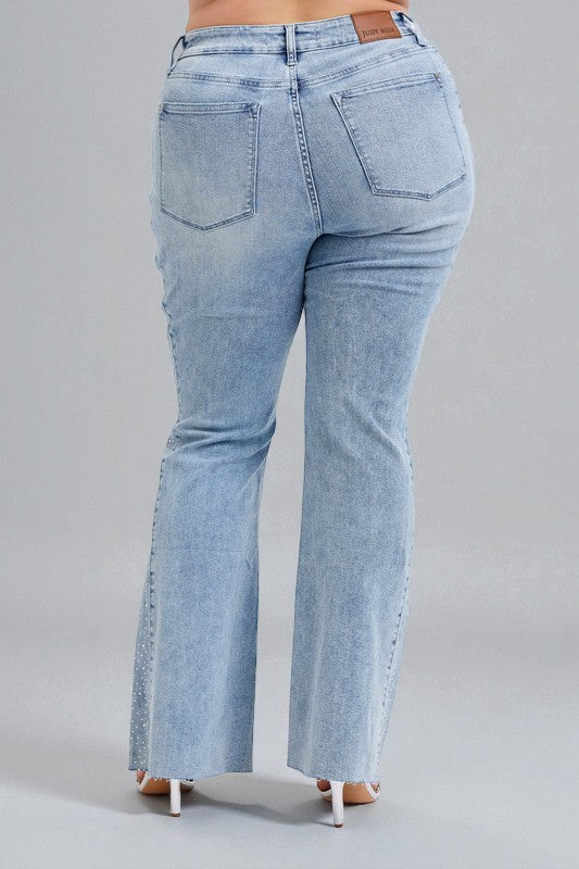 Light blue jeans on a gray background