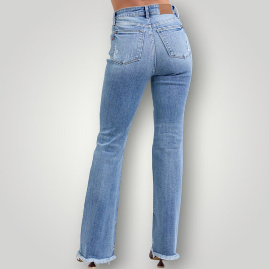 Light blue jeans on a plain background