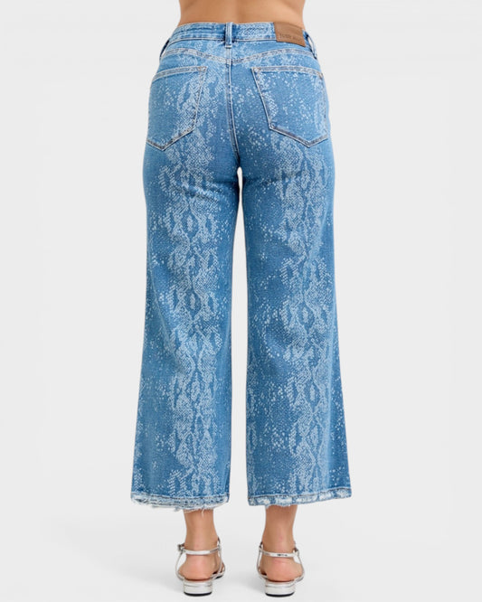 Blue acid-wash jeans on a white background
