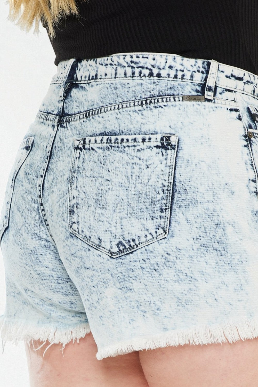 Light blue acid-wash denim shorts with a back pocket.