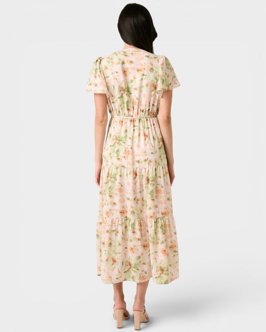 Woman wearing a floral dress on a white background