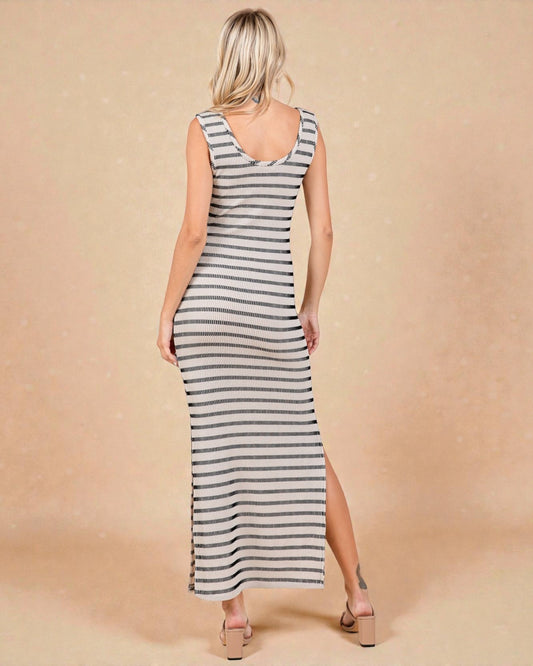 Woman wearing a striped dress with a beige background