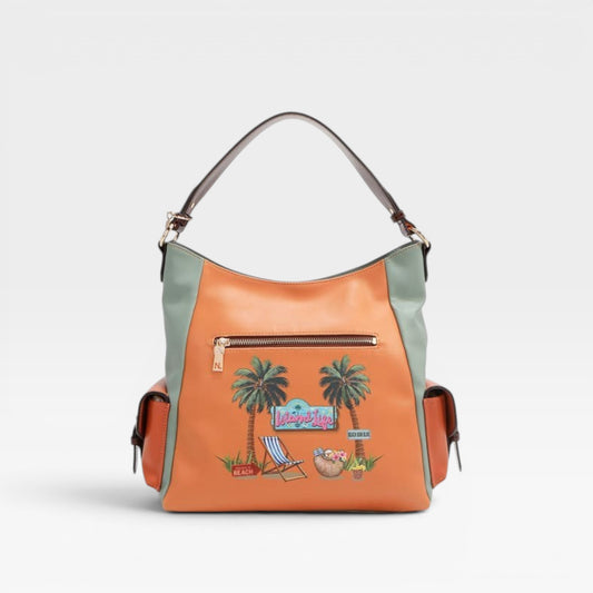 Handbag with palm tree design on a light gray background