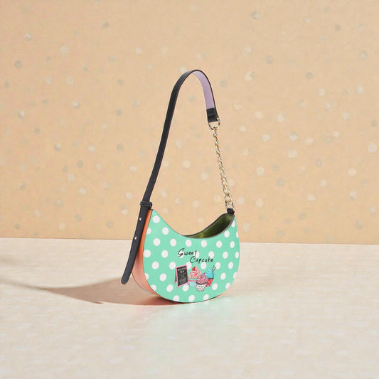 Green polka dot handbag with a chain strap on a beige background