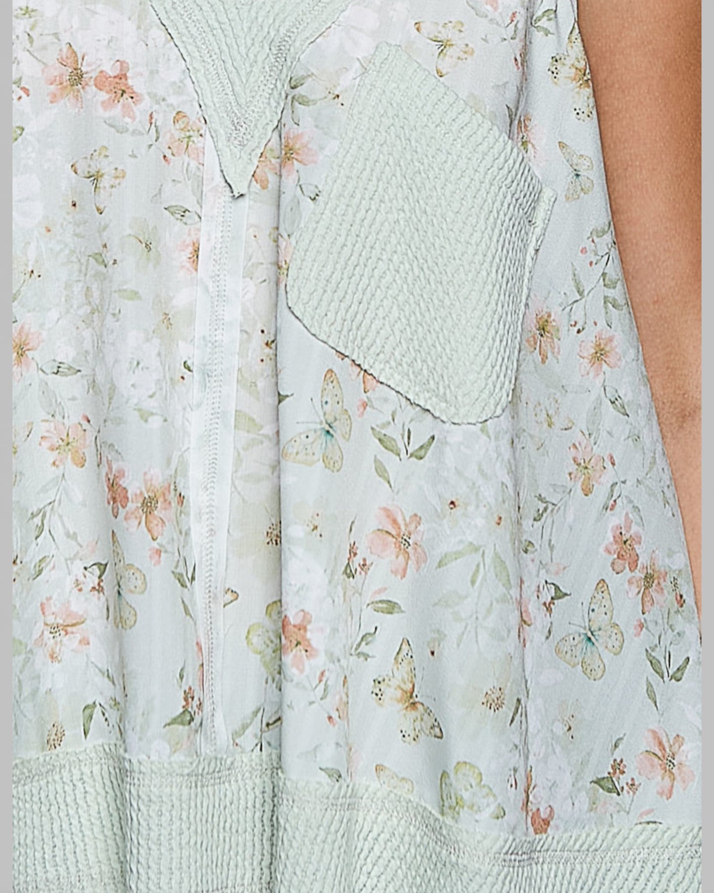 Light blue floral dress with a textured fabric pattern