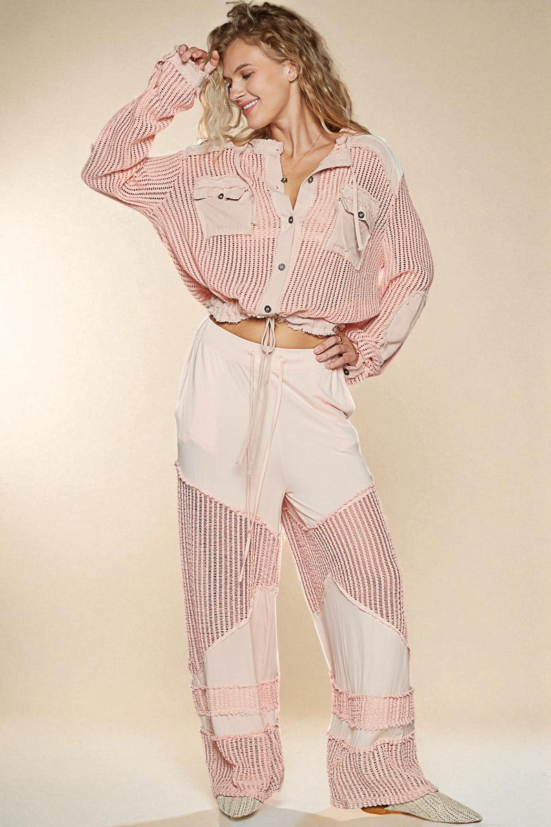 Woman wearing a pink and white checkered outfit on a beige background