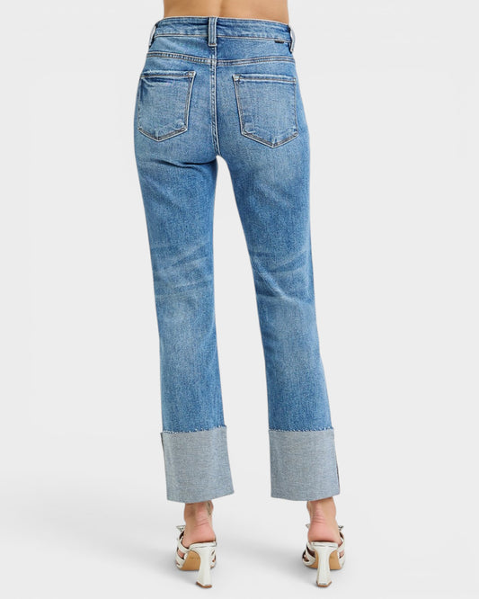 Blue jeans with a white background