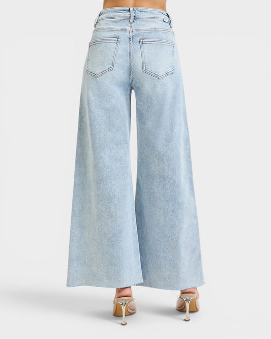 Light blue wide-leg jeans on a white background