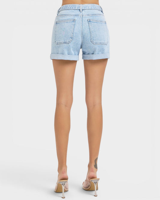Light blue denim shorts worn by a person on a white background
