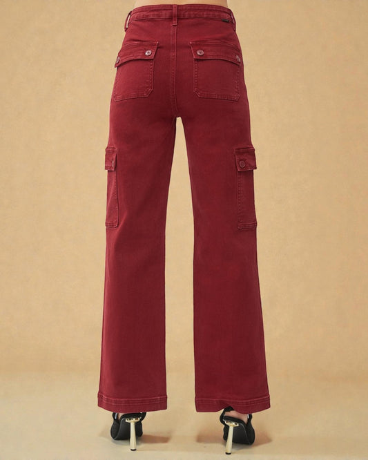 Red cargo pants on a beige background