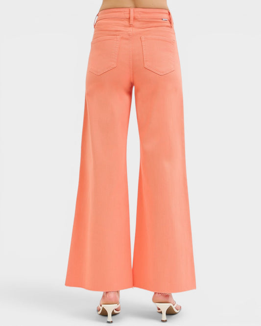 Coral wide-leg pants on a white background