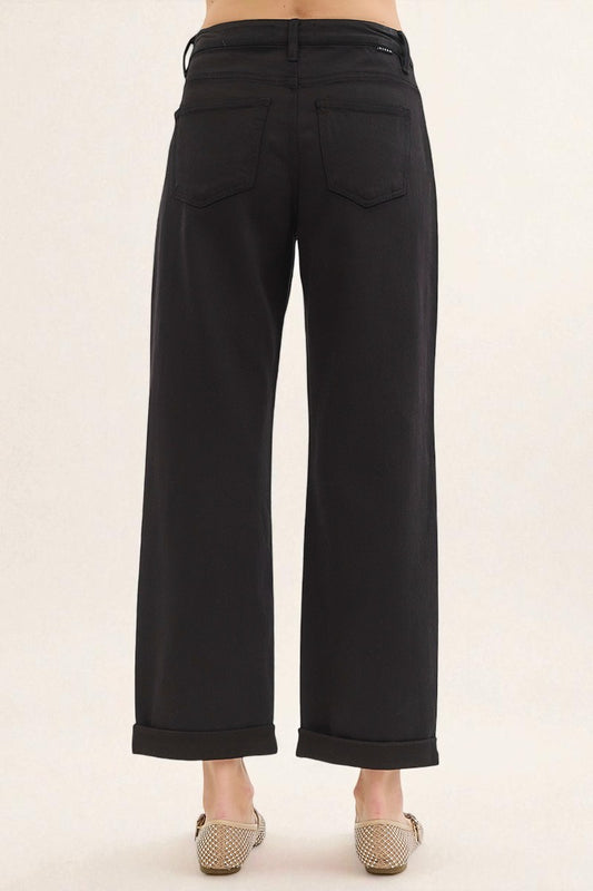 Black pants on a plain background