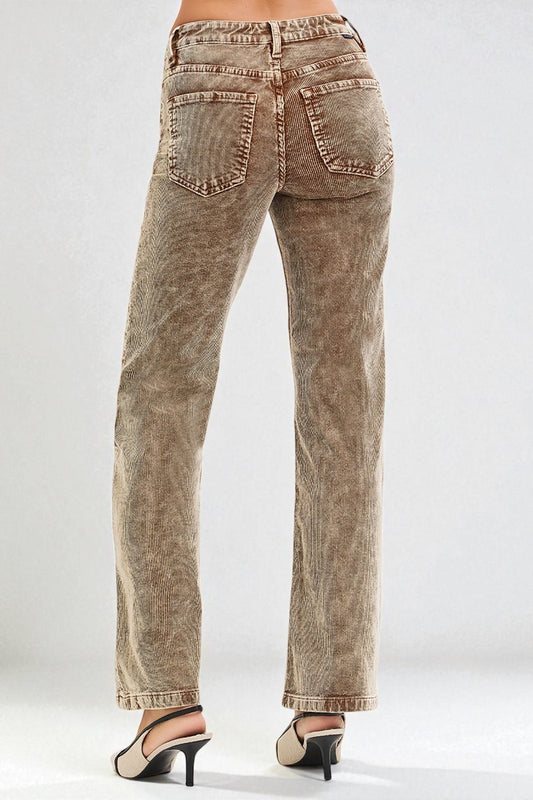 Brown acid-wash jeans on a white background