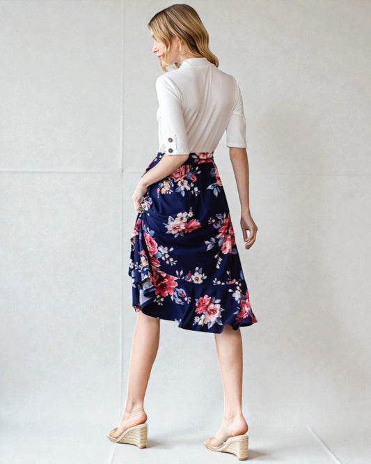 Jupe mi-longue portefeuille fleurie à ourlet volanté en bleu marine