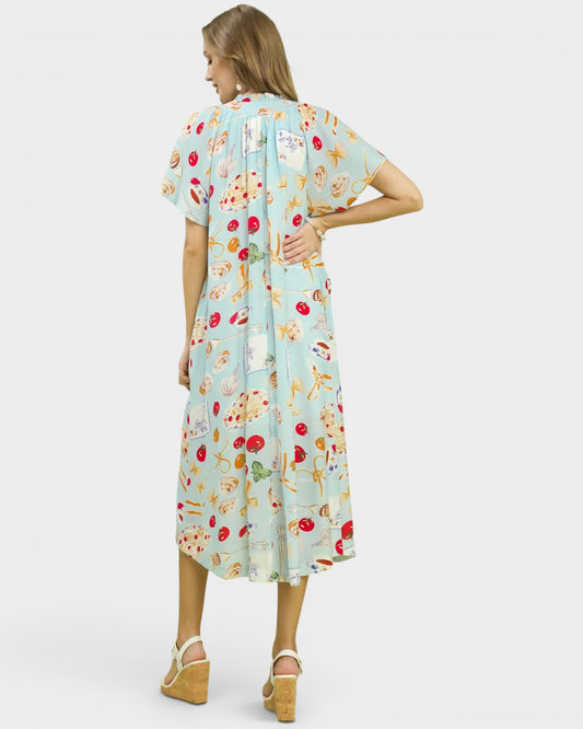 Woman wearing a floral dress on a white background