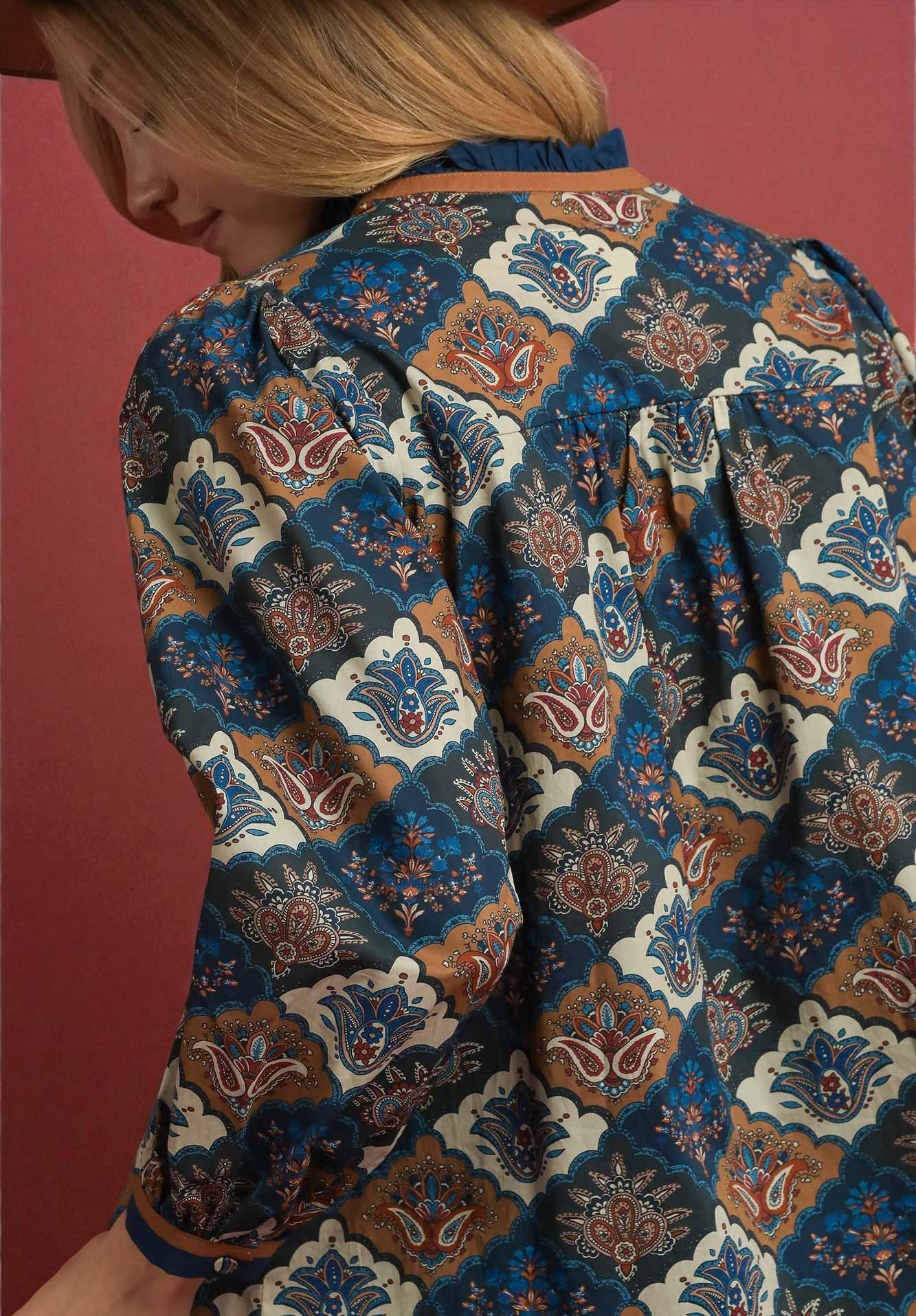 Patterned shirt with a red background