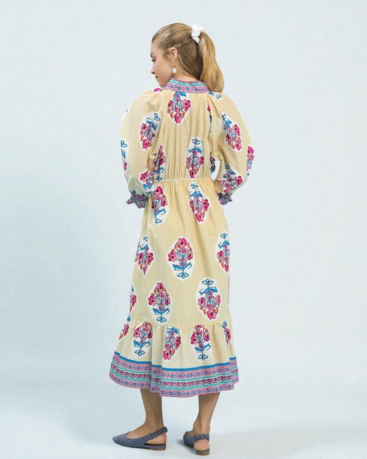 Woman wearing a floral dress on a white background