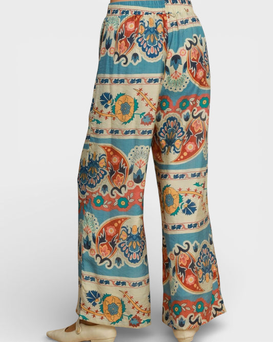 Colorful patterned pants on a white background