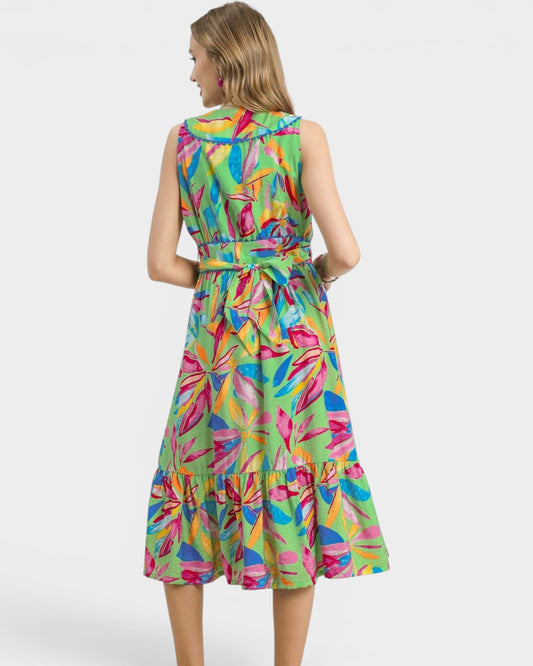 Woman wearing a colorful dress with a white background