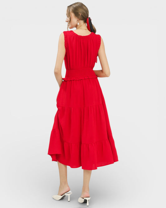 Woman wearing a red dress on a white background