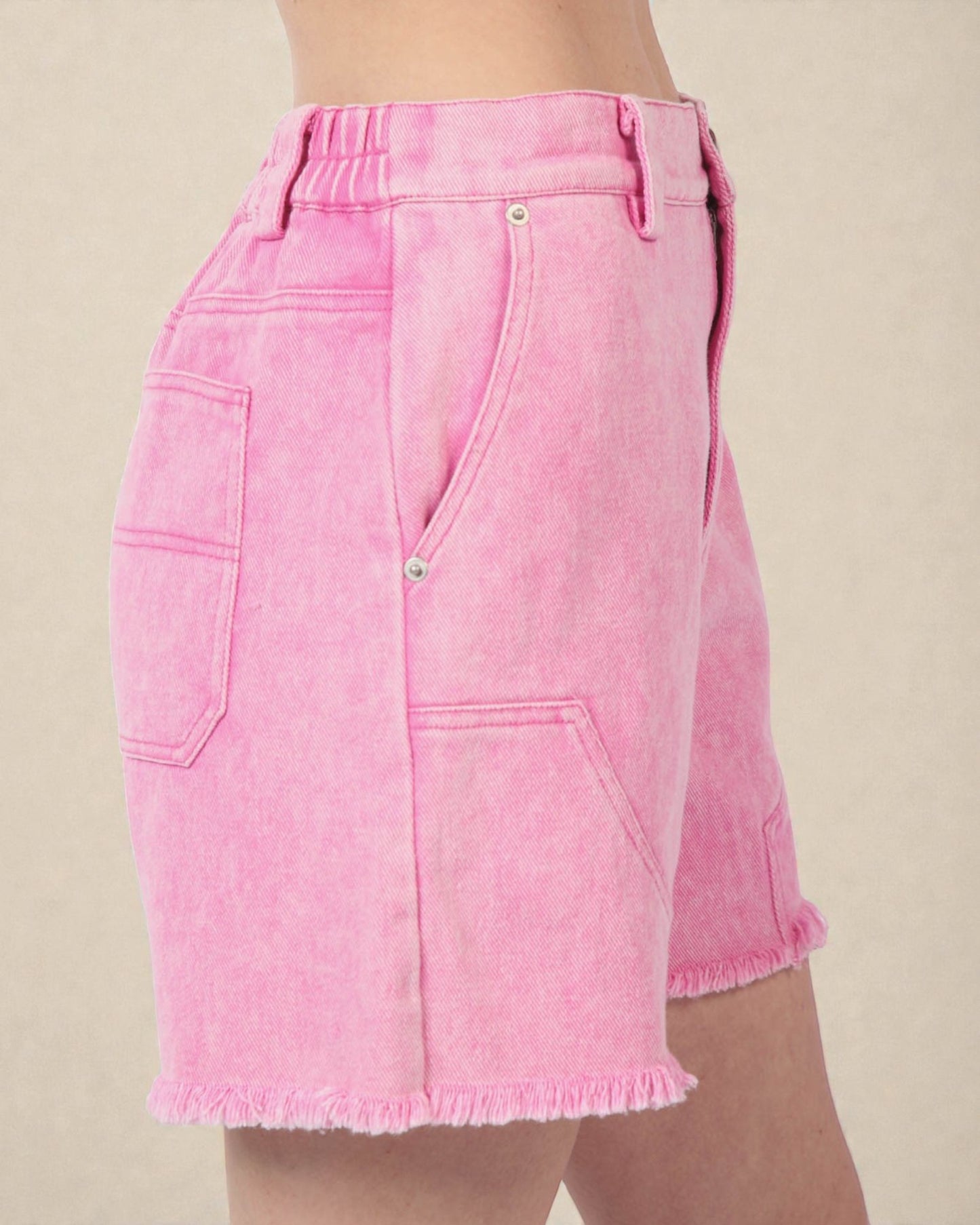 Short en jean rose délavé à ourlet brut