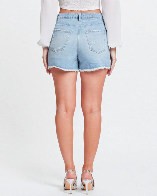 Light blue denim shorts worn by a person on a white background