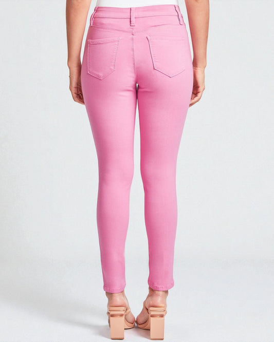 Pink jeans worn by a person on a white background