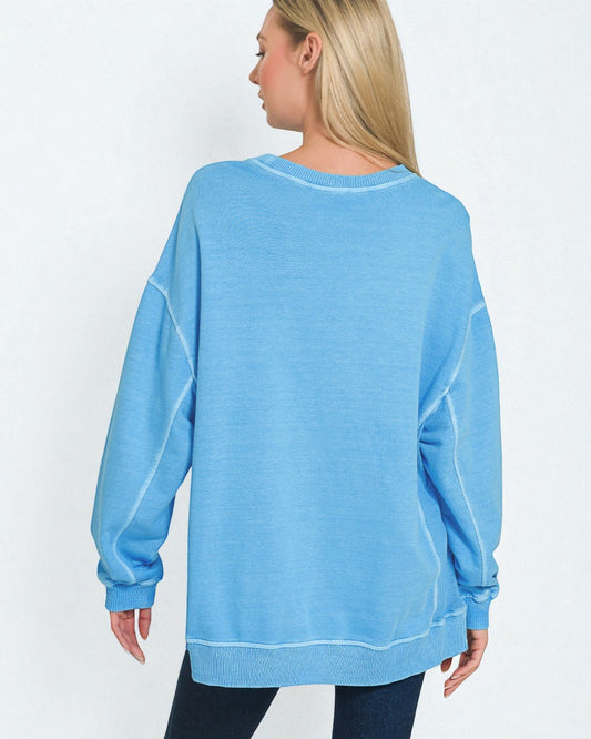 Person wearing a blue sweatshirt on a white background
