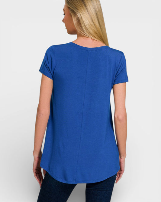 Woman wearing a blue t-shirt on a white background
