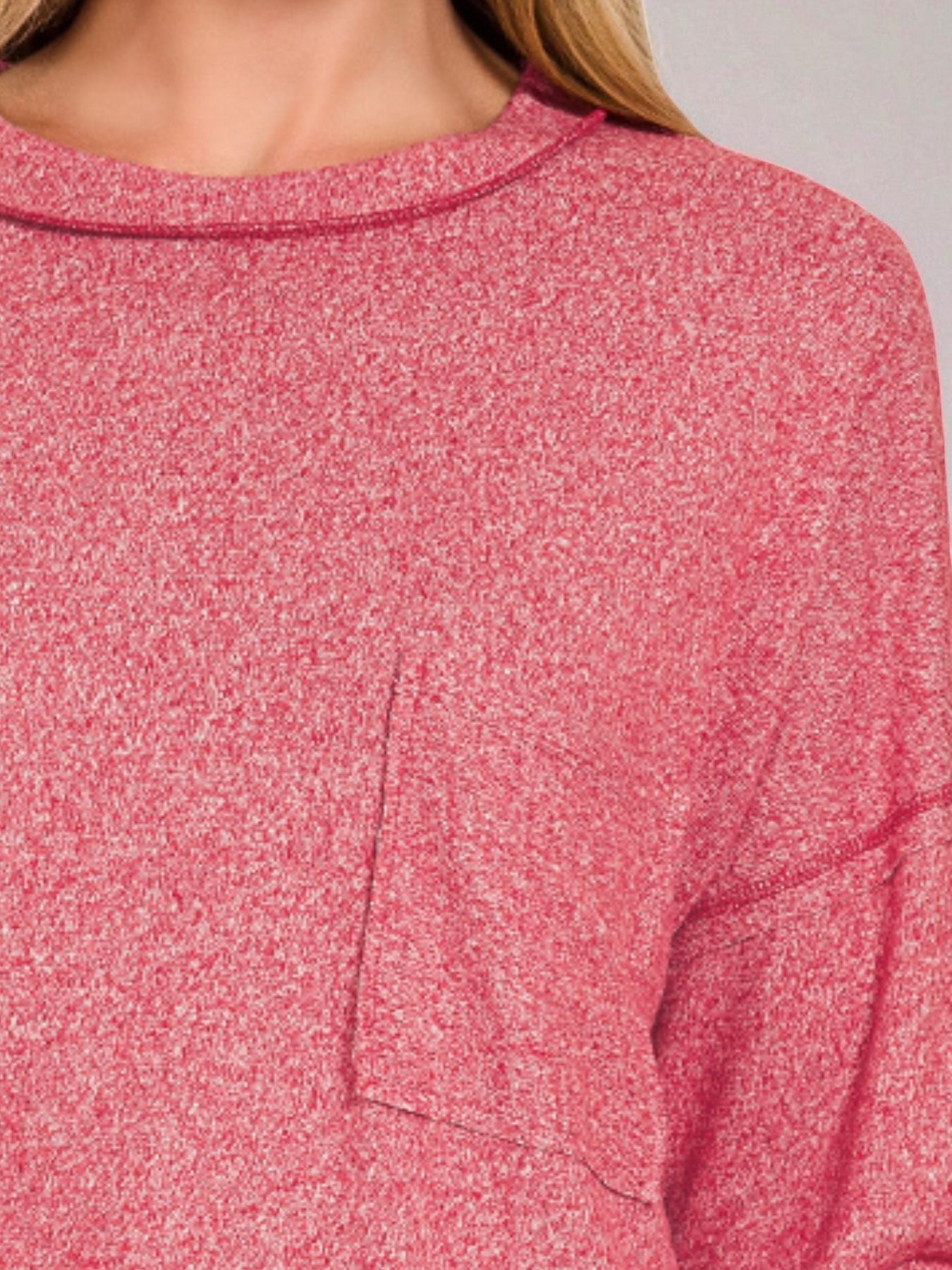 Close-up of a pink textured sweater