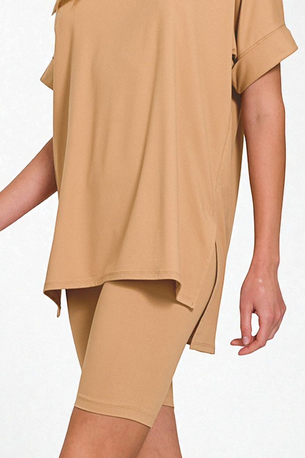 Beige top and shorts set on a white background