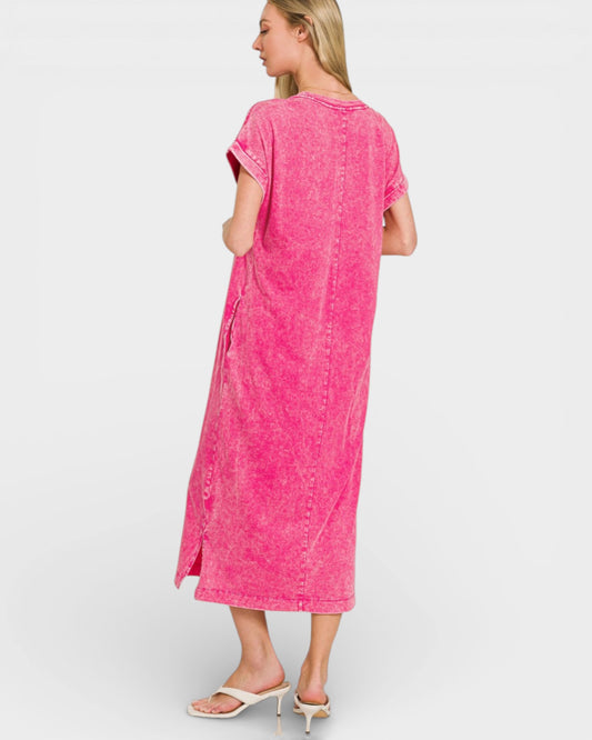 Woman wearing a pink dress on a white background