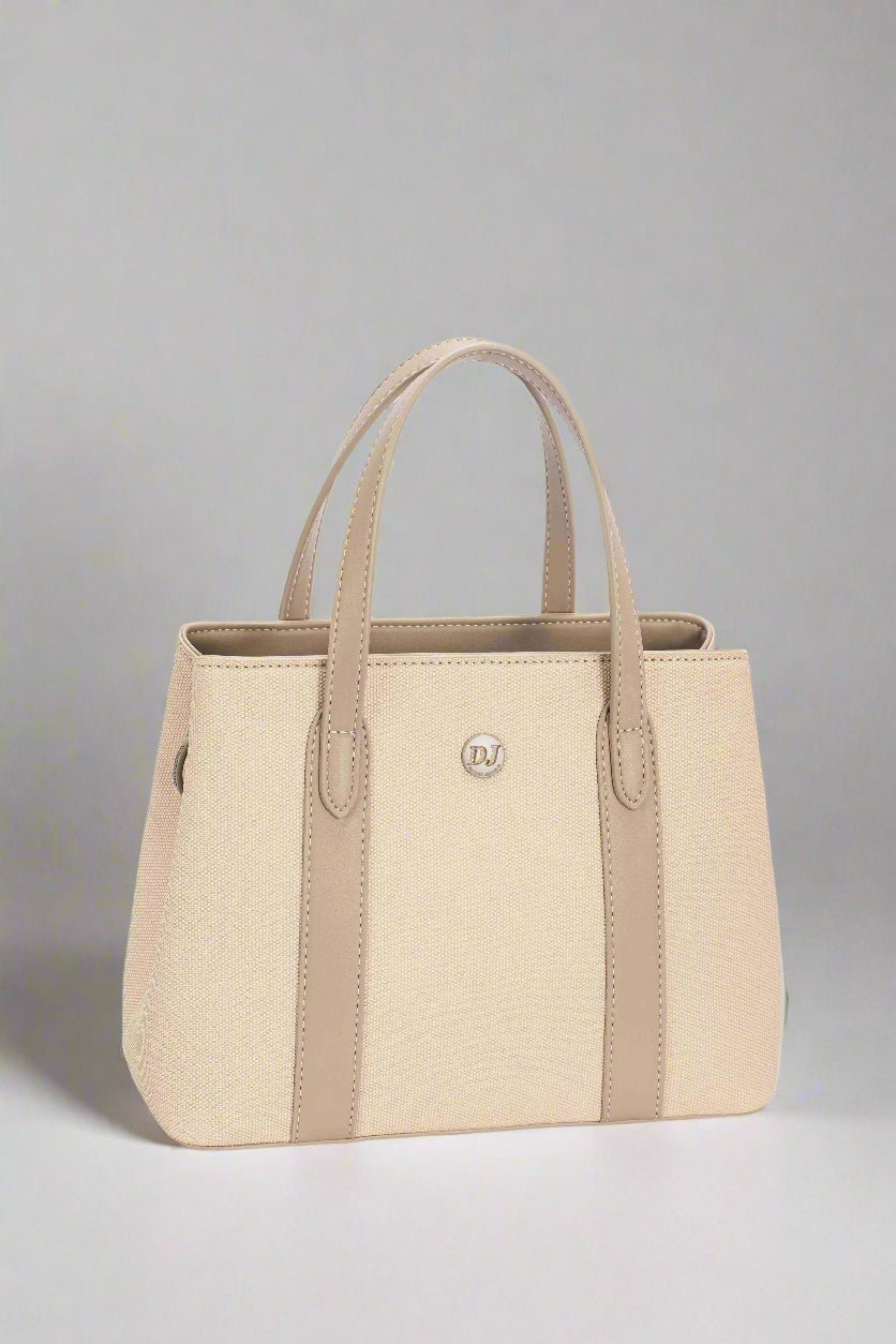 Beige handbag with brown accents on a white background