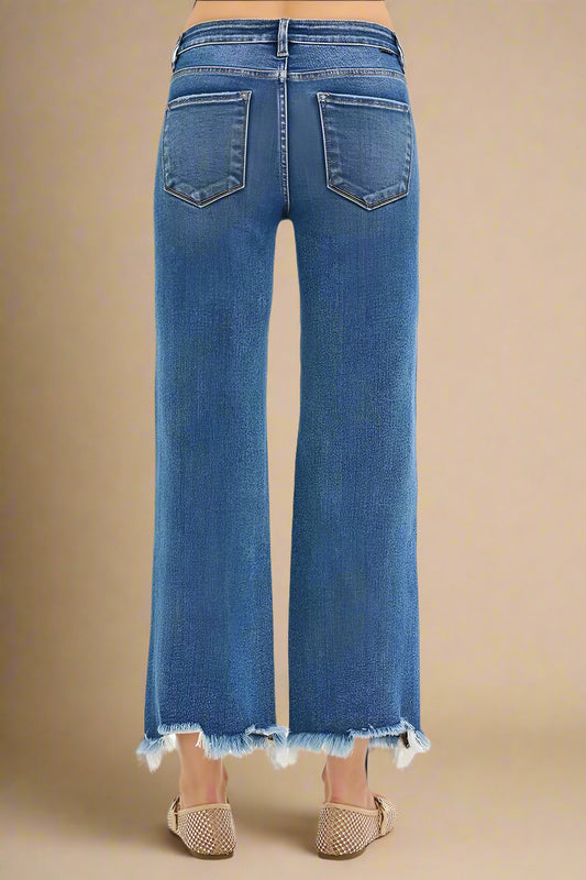 Blue jeans with a beige background