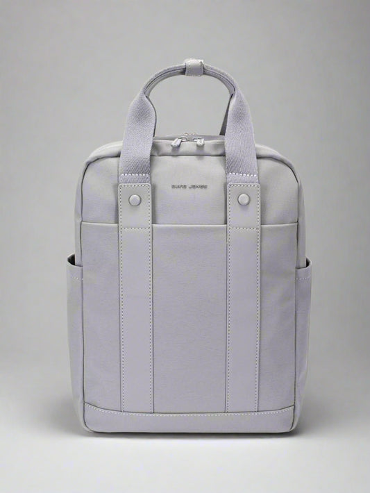 Gray backpack with visible brand name on a white background
