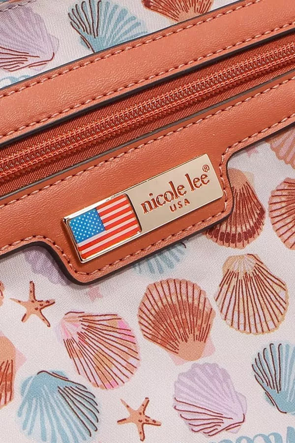 Close-up of a tan leather product with a 'nicole lee' label on a background with shell patterns.
